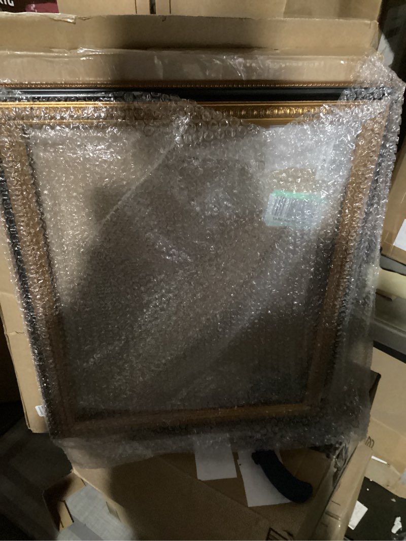 Condition photo showing item condition for FOLKOR Canvas Frame for 16x20 Paintings, Finished Antique Ornate Frame for Landscape Portrait, Black and Gold Wood Frame for Home Office Gallery Wall Decor (No Plexiglass & Backing Board) 16x20" Black Gold