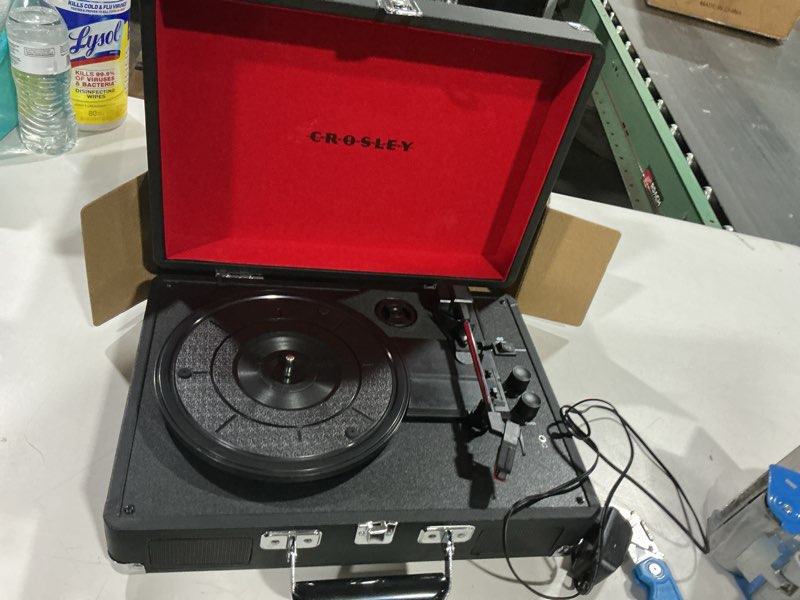 Condition photo showing As Is for crosley cr8005f-bk cruiser plus vintage 3-speed bluetooth in/out suitcase vinyl record player turntable, black/red