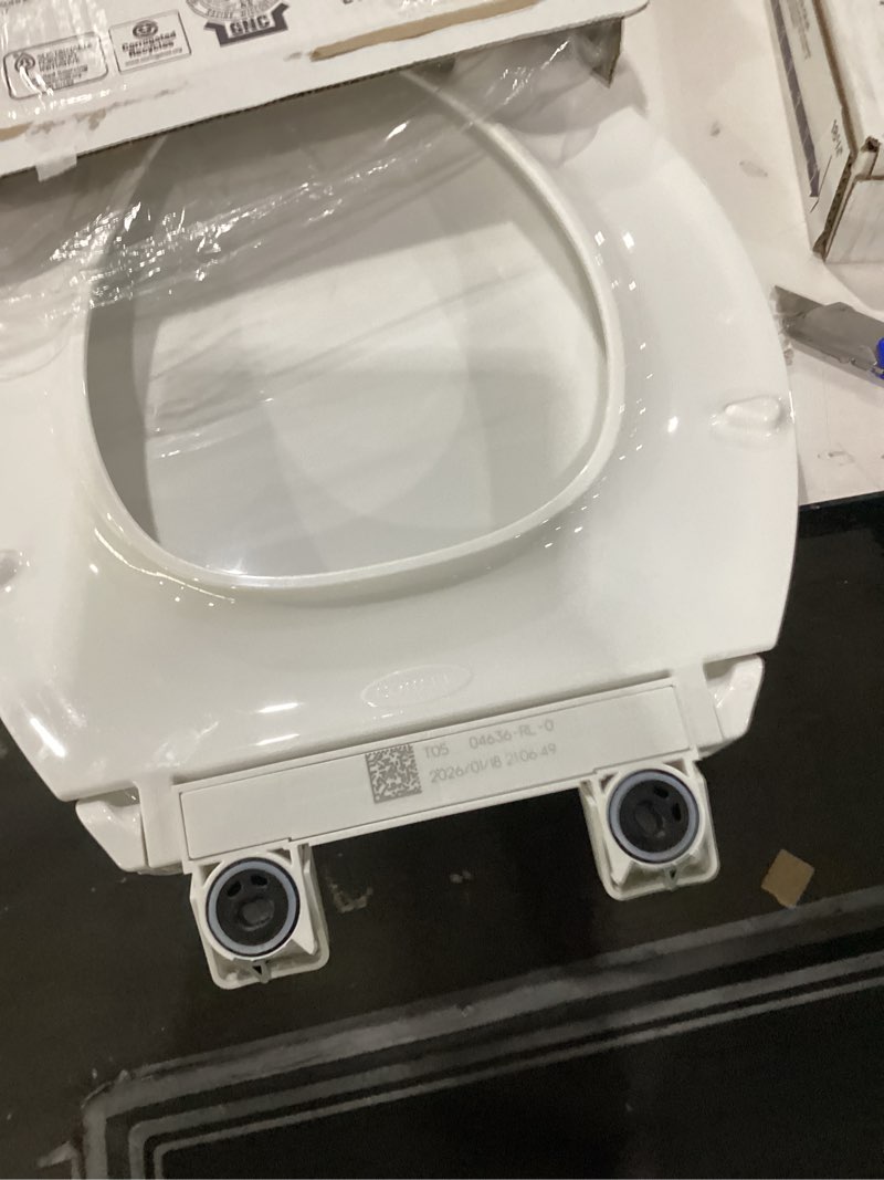 Condition photo showing New/Like New for KOHLER 4636-RL-0 Cachet ReadyLatch Elongated Toilet Seat Slow Close, Soft Close Toilet Seat Quiet Lid, Contoured Grip-Tight Bumpers Installation Hardware, Apartment Essentials, White White Elongated Ready Latch