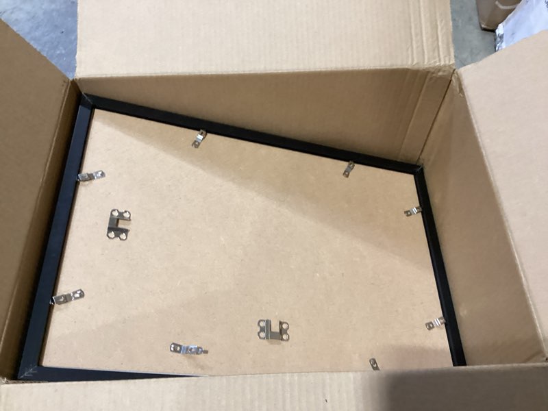 Condition photo showing As Is for pealsn 12x18 picture frame black, poster frame for wall mounting display horizontally or vertically hanging, 1 pack black 12x18