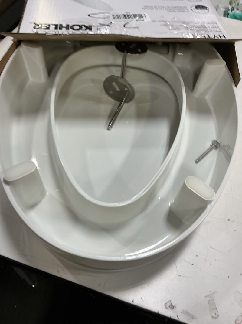 Condition photo showing As Is for KOHLER 25875-0 Hyten 3" Height, Elevated Soft Close Elongated Toilet Seat, Contoured Seat with Grip-Tight Bumpers, Quick-Attach Hardware, No Slam Toilet Seat, White White Elongated