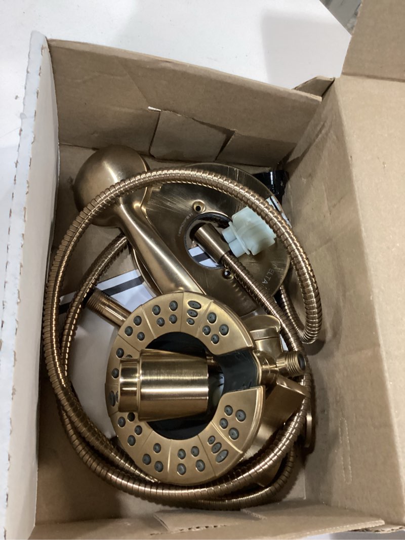 Condition photo showing As Is for delta faucet albion 14 series single-handle shower faucet, gold shower trim kit with 4-setting in2ition 2-in-1 dual hand held shower head with hose, champagne bronze t142855-cz-i (valve not included)
