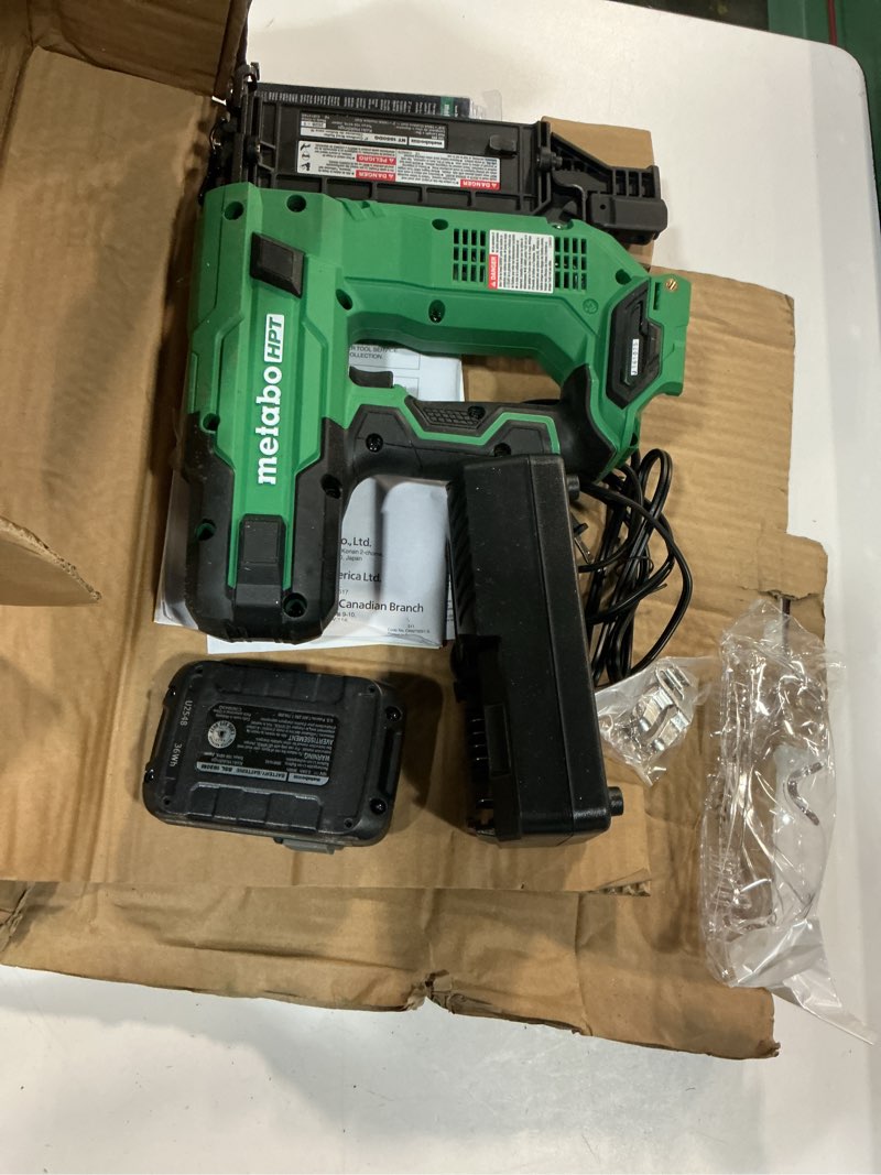 Condition photo showing As Is for metabo hpt multivolt 18 ga. cordless compact brad nailer kit (battery & charger) 18 v