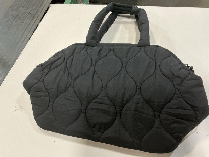 Condition photo showing New/Like New for featherweight travel bag, black