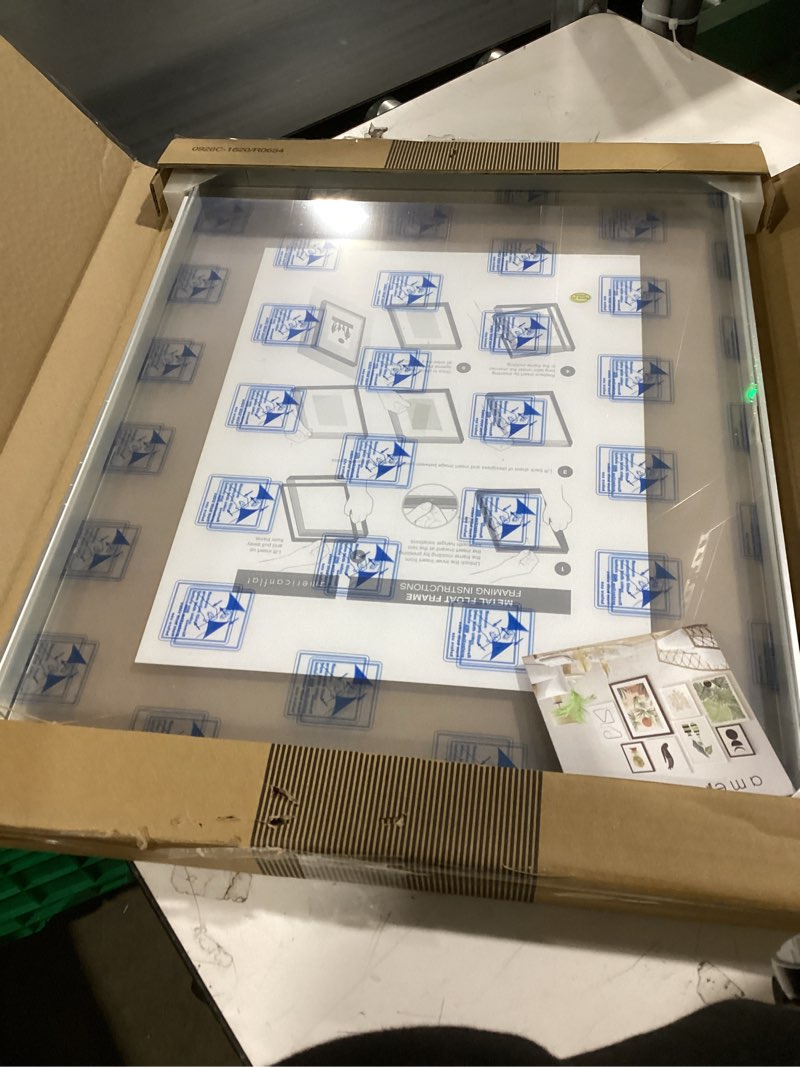 Condition photo showing Good Condition for Americanflat Aluminum 16x20 Floating Picture Frame with Shatter-Resistant Glass - Use as 11x14 Picture Frame or Display 16x20 Photo - Signature Float Collection - Photo Frames for Wall - Silver Silver 16X20 1 Pack