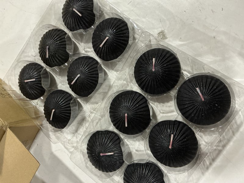 Condition photo showing As Is for 12 pack 3 inch black floating candles, 10 hour unscented dripless tealight candles for cylinder vases, centerpieces at wedding party halloween - wavy float candle