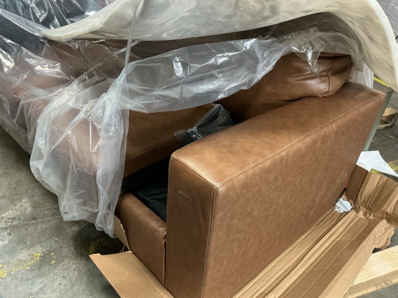Condition photo showing Good Condition for Signature Design by Ashley Bolsena Contemporary 2-in-1 Leather Match Sofa Sleeper with Folding Gel Memory Foam Mattress, Queen, Dark Brown