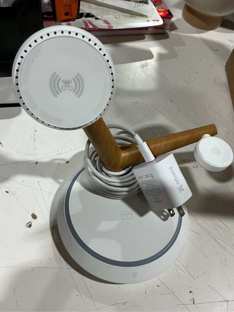 Condition photo showing As Is for atomi qi2 magnetic wireless charging stand