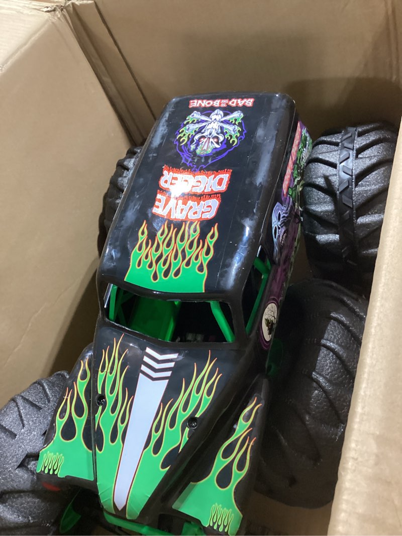 Condition photo showing As Is for monster jam, official mega grave digger all-terrain remote control monster truck, over 2 ft. tall, 1:6 scale, kids toys for boys and girls ages 4 and up mega grave digger (v2)