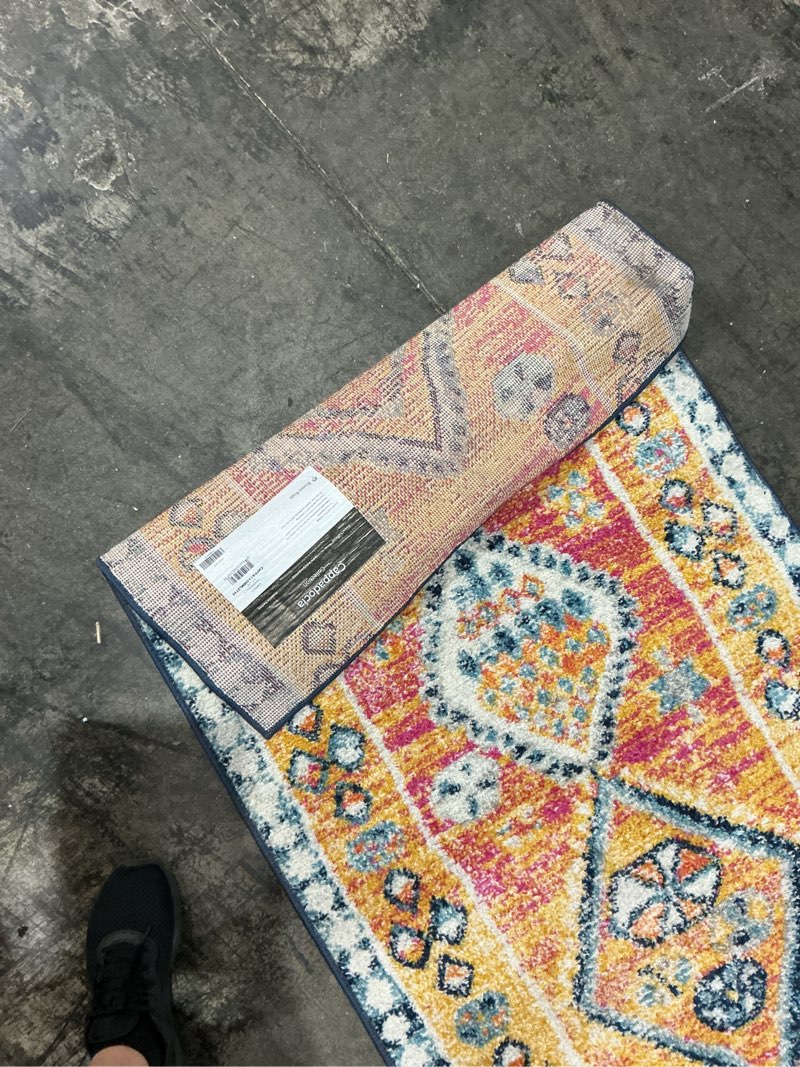 Condition photo showing As Is for cappadocia collections …hallway mat 27 x 10