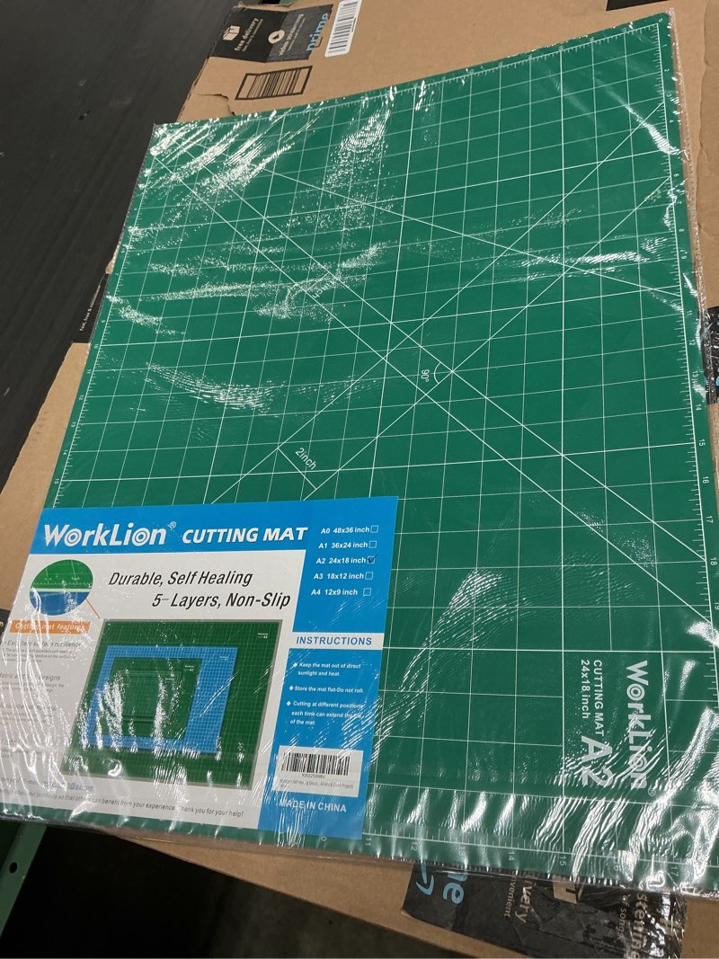 Condition photo showing New/Like New for worklion 18'' x 24'' large self healing pvc cutting mat, double sided, gridded rotary cutting board for craft, fabric, quilting, sewing, scrapbooking - art project… 24"l x 18"w green/blue