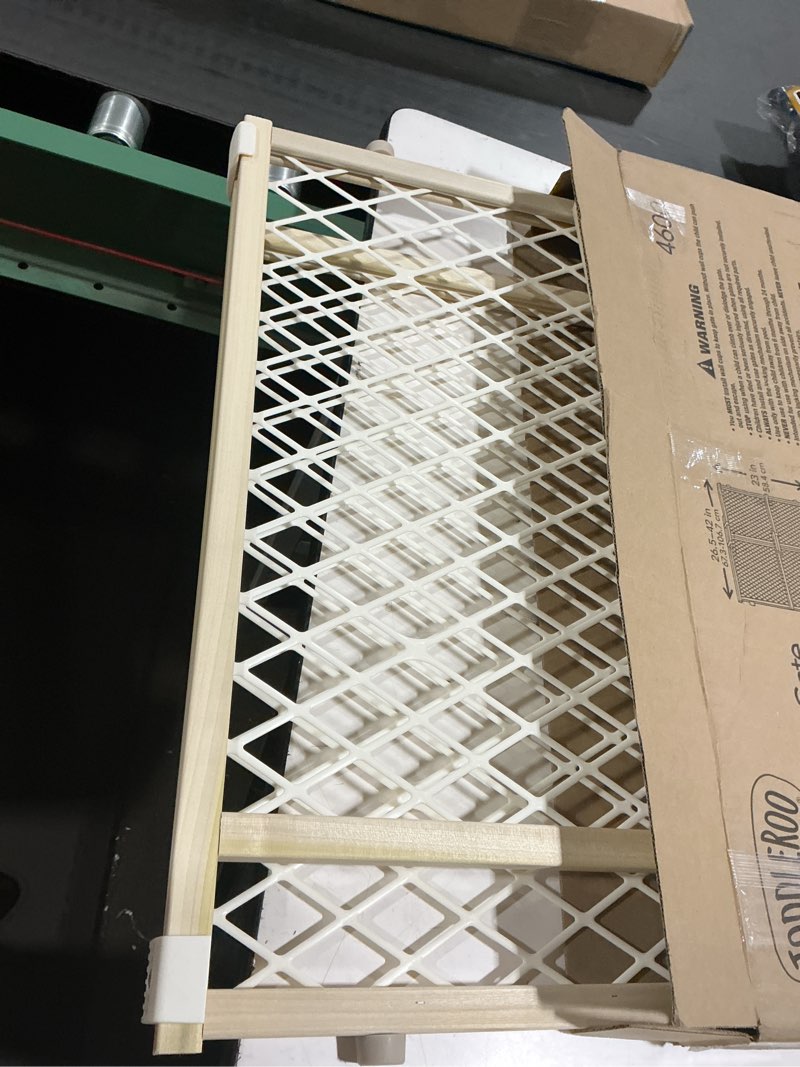 Condition photo showing As Is for Toddleroo by North States Diamond Mesh Wooden Baby Gate: 26.5"- 42" Wide. Pressure Mounted Baby Gate for Doorway. (23" Tall, Sustainable Hardwood)