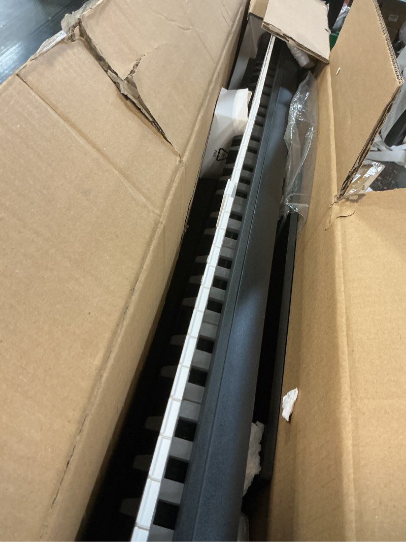 Condition photo showing As Is for Alesis Melody 61 MK4 Keyboard Piano for Beginners with 61 Keys Speakers, Tablet/Sheet Music Stand, 300 Sounds and Music Lessons