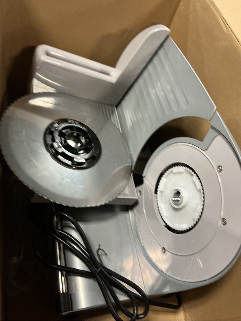 Condition photo showing As Is for weston electric meat cutting machine, deli & food slicer, adjustable slice thickness, non-slip suction feet, removable 9” stainless steel blade, easy to clean removable 9" stainless steel blade