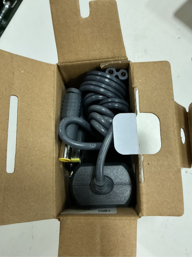 Condition photo showing As Is for onn. 65w laptop charger w/10 interchangeable tips, 10 ft power cord for hp, dell, lenovo laptops