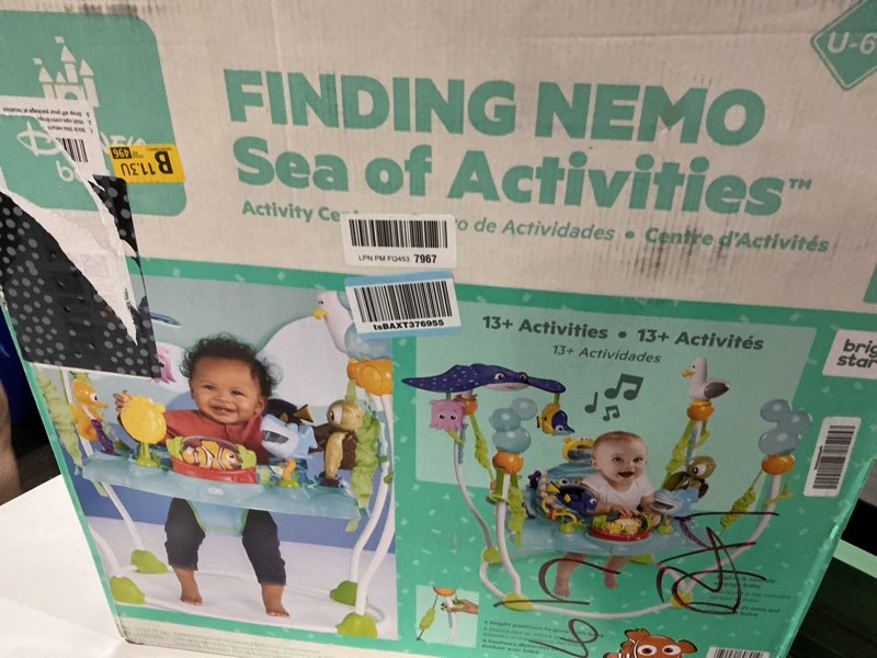 Condition photo showing New/Like New for bright starts disney baby finding nemo sea of activities baby activity center jumper with interactive toys, lights, songs & sounds, 6-12 months (blue)