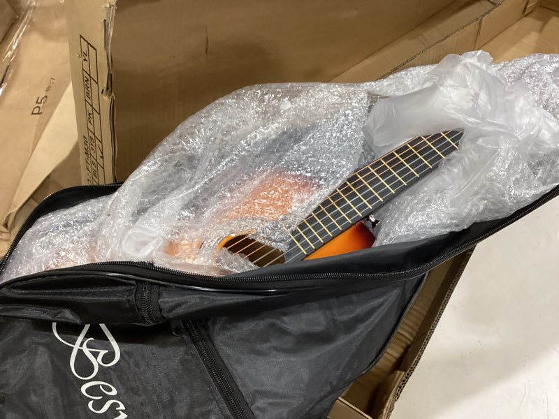 Condition photo showing Good Condition for 30in beginner acoustic guitar basic starter kit tuner capo strings winders strap picks kids student youth guitar pickguard with gig bag orange