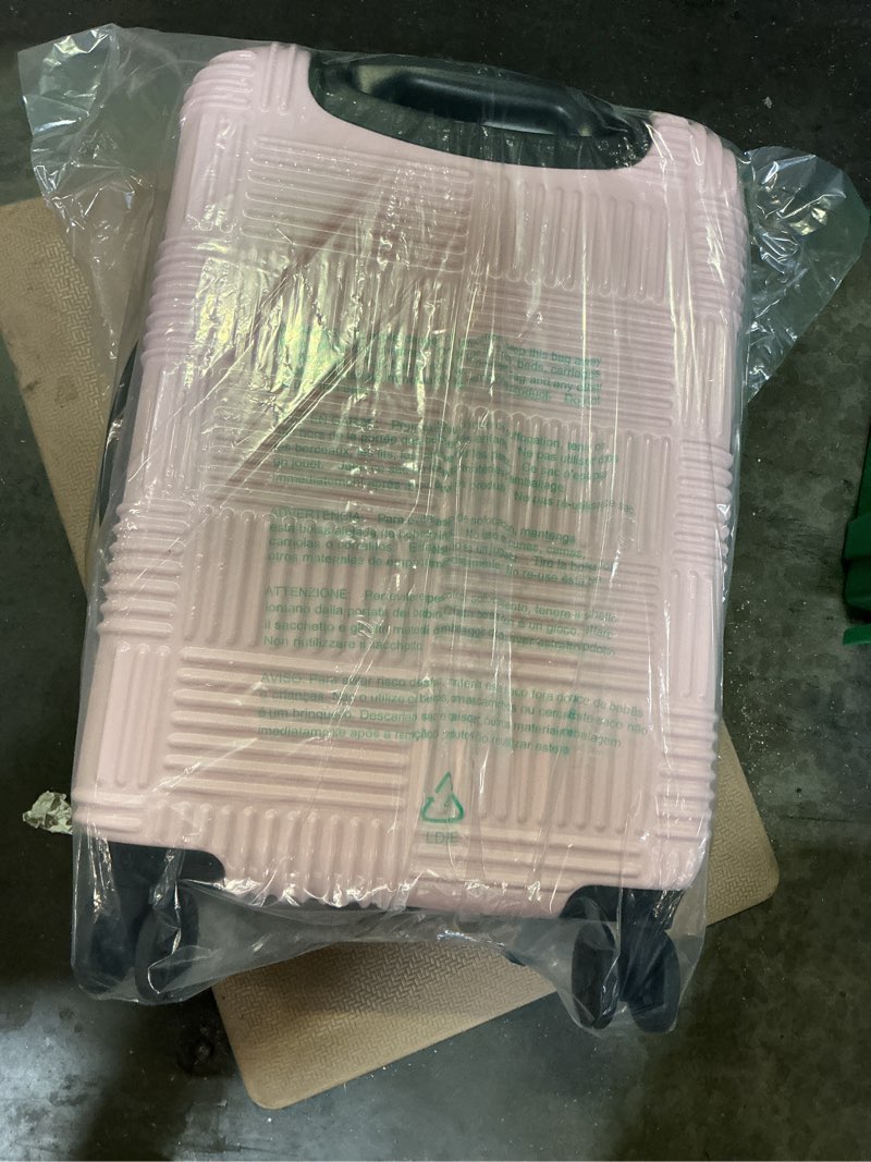 Condition photo showing New/Like New for american tourister nxt checkered hardside carry on spinner suitcase - pink