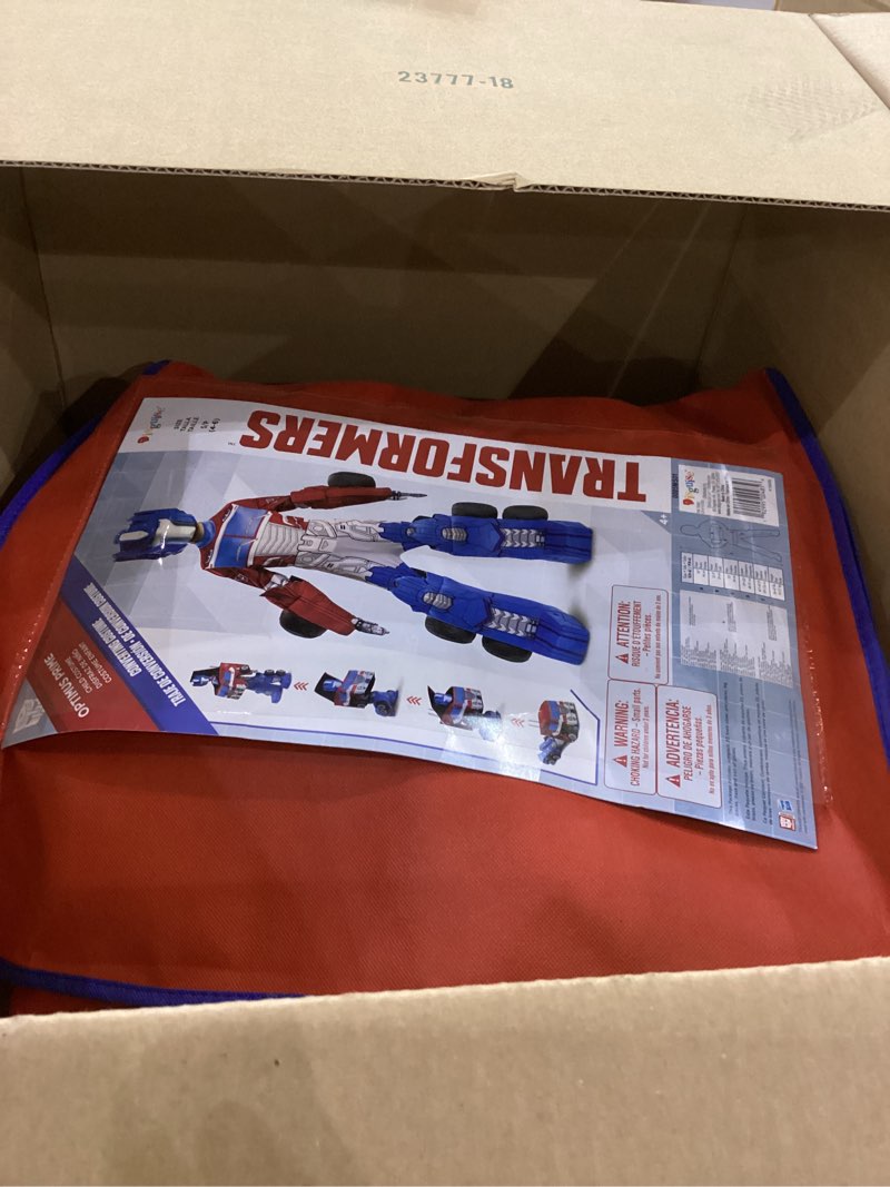 Condition photo showing Good Condition for Optimus Prime Costume, Official Converting Transformer Costumes for Boys, Convertible Character Suit Small (4-6)