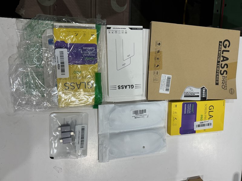 Condition photo showing As Is for assorted cellphone/tablet/laptop case covers & accessories