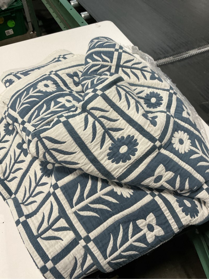 Condition photo showing As Is for organic cotton jacquard floral coverlet(67 in x 89 in )