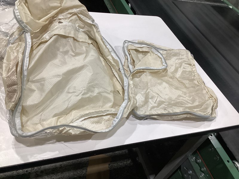 Condition photo showing As Is for DIMJ Clothes Storage Bag 8 Pack, 19L Compression Storage Bags for Sweater, Closet, Sheet Storage Organizer with Window Handle, Compression Packing Cubes Space Saver Storage Bags with Zipper Beige 19L x 8 Pack