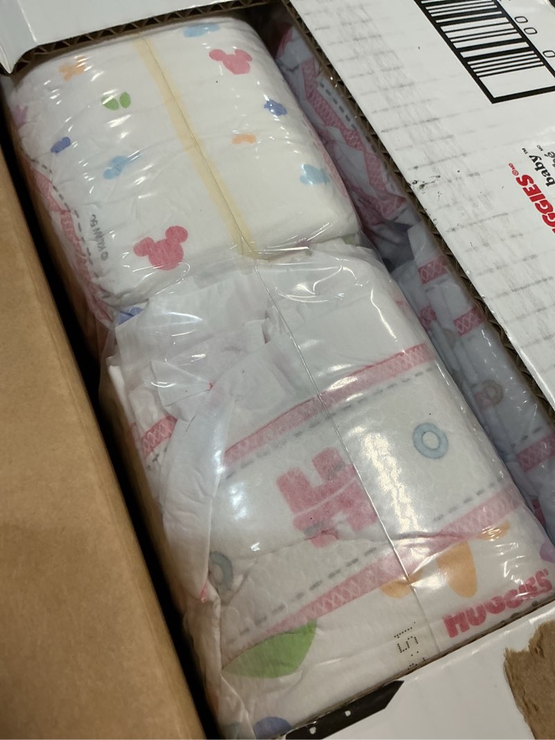 Condition photo showing New/Like New for huggies size 5 diapers, snug & dry baby diapers, size 5 (27+ lbs), 84 count, packaging may vary size 5 84