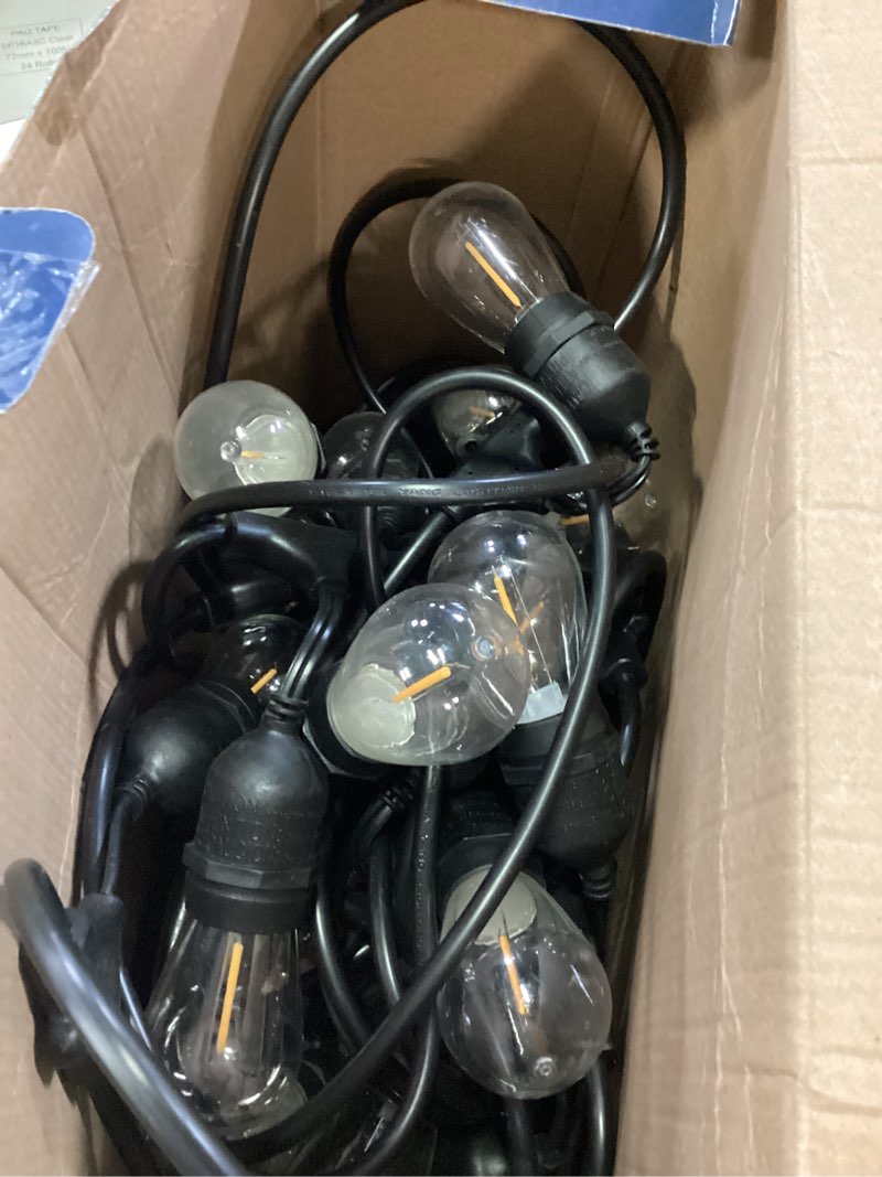 Condition photo showing As Is for harbor breeze 48-ft plug-in black indoor/outdoor string light with 24 white -light led edison bulbs