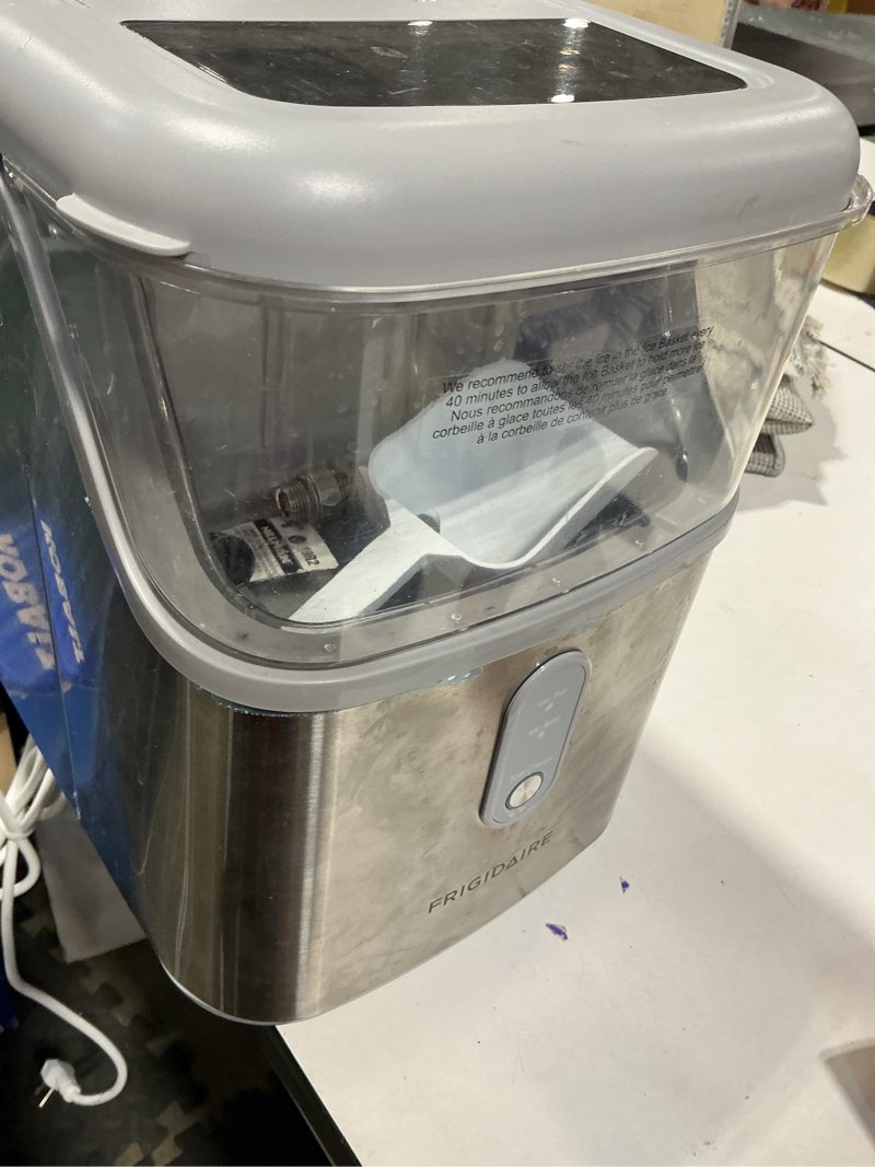 Condition photo showing As Is for frigidaire countertop crunchy chewable nugget ice maker, compact, 33lbs per day, metallic finish