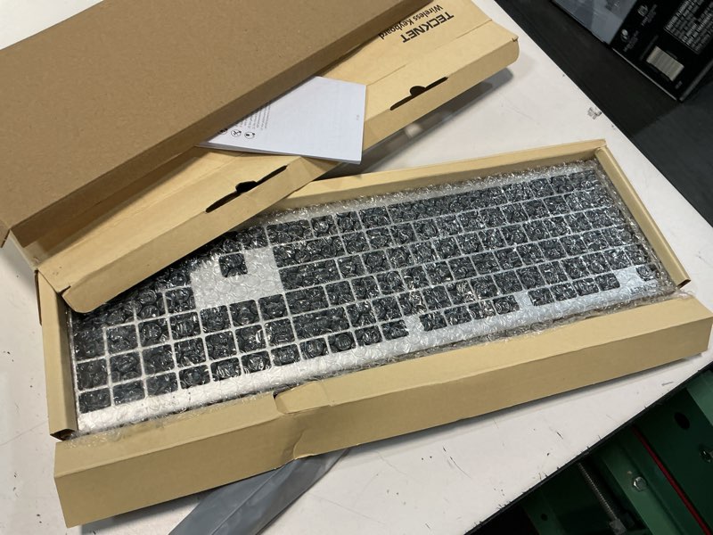 Condition photo showing Good Condition for tecknet bluetooth keyboard rechargeable, 4-device free switching (2.4g+bt), ultra-slim full size wireless keyboard, quiet typing, for pc/laptop/smart tv/phone, adjustable stand, 12 multimedia keys silver&grey