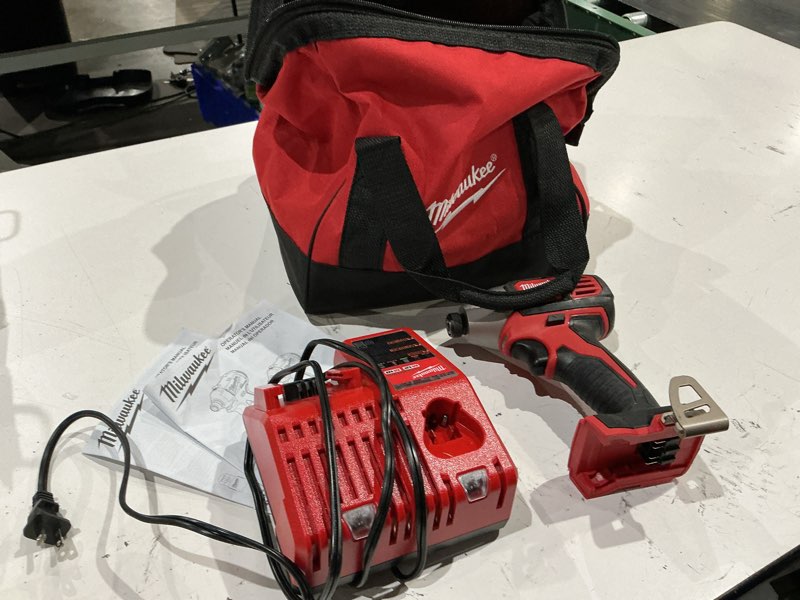 Condition photo showing As Is for milwaukee 2850-21p m18 brushless lithium-ion compact 1/4 in. cordless hex impact driver kit (2 ah)