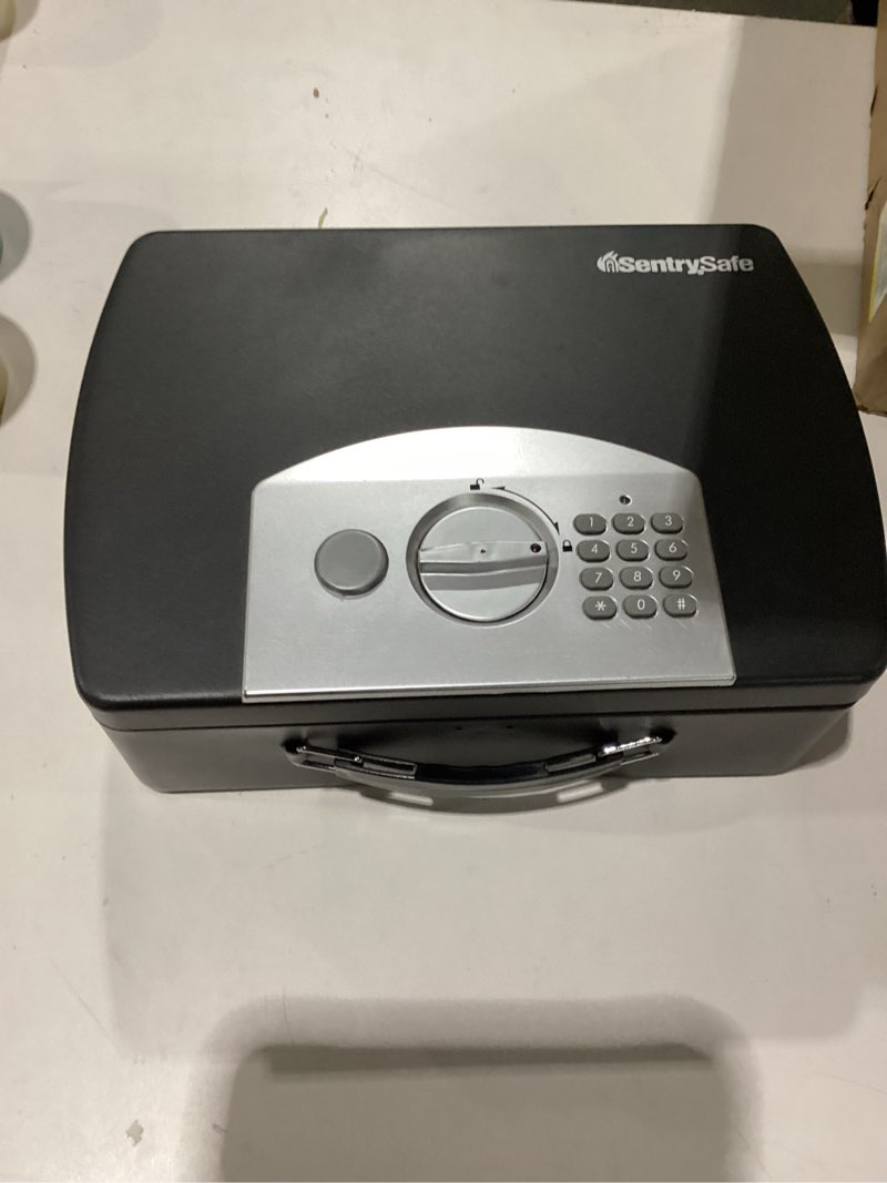 Sentry safe (no code or key in box) As is