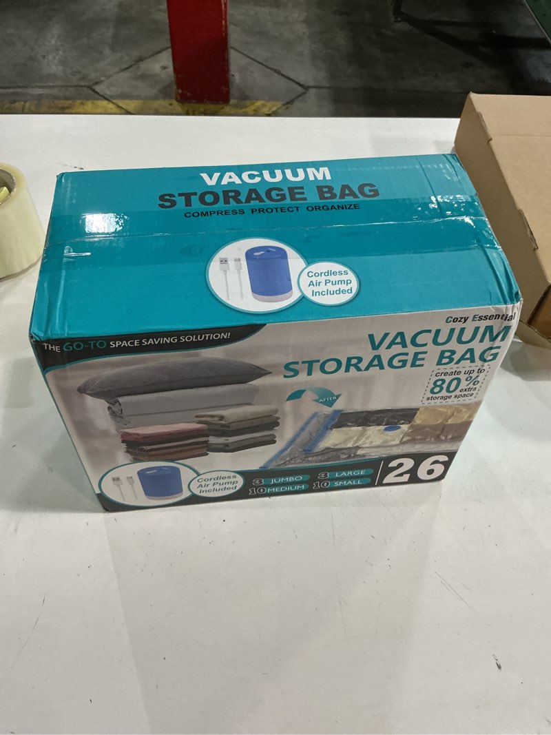 Condition photo showing New/Like New for cozy essential 26 pack vacuum storage bags with portable rechargeable wireless electric pump, vacuum seal space saver bags for clothing, pillows, blanket, bedding, comforters 26 pack-e