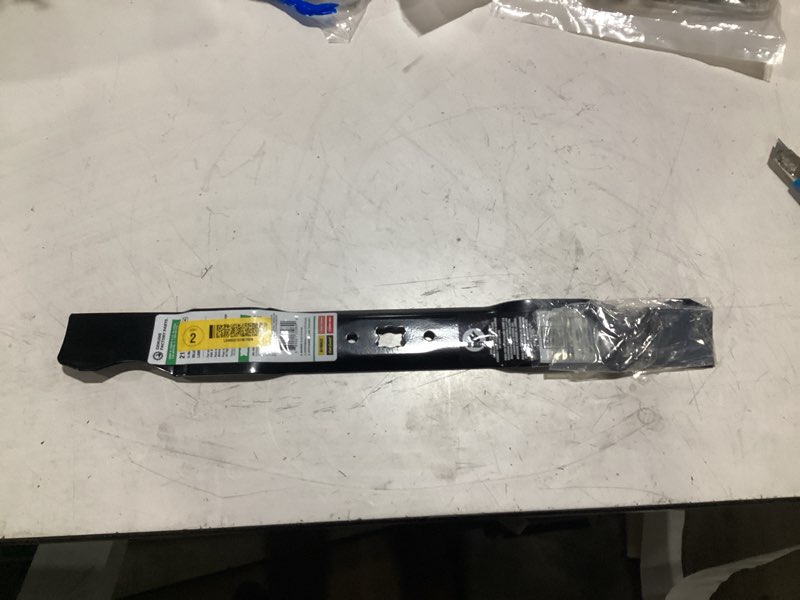 Condition photo showing Good Condition for original equipment 3-in-1 blade for 21 in. walk-behind lawn mowers with a bow-tie center hole oe# 942-0741