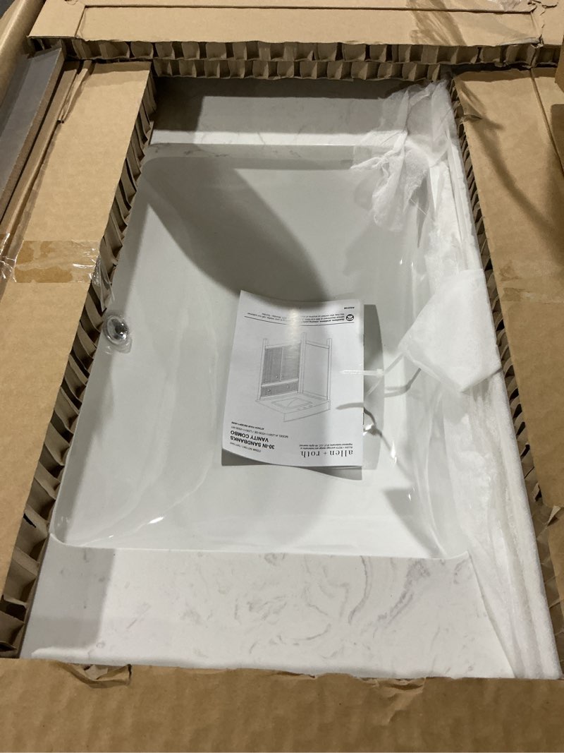 Condition photo showing As Is for allen + roth sandbanks 30-in greige undermount single sink bathroom vanity with white engineered stone top