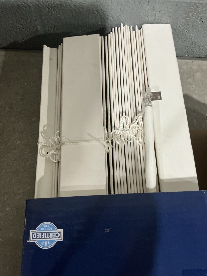 Condition photo showing As Is for levolor trim+go 2-in slat width 31-in x 64-in cordless white faux wood room darkening horizontal blinds