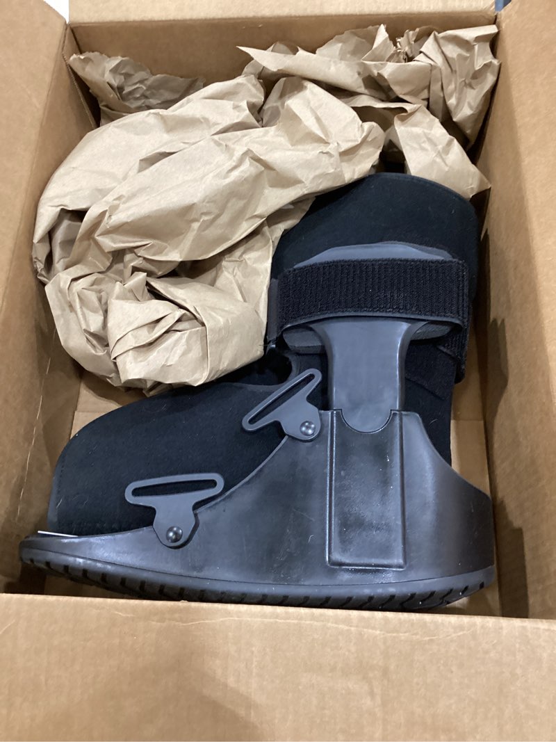 Condition photo showing As Is for united ortho short air cam walker fracture boot, large, black black large boot