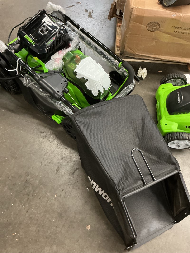 Condition photo showing As Is for greenworks 48v (24v x 2) 17" brushless cordless push lawn mower, includes (2) 4.0ah batteries and dual port rapid charger((200+ compatible tools, 45min runtime) 17" (2 x 4.0ah) gen 2