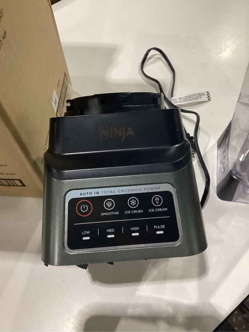 Condition photo showing As Is for damaged ninja professional plus blender | max power smoothie blender, ice cream maker, frozen drink mixer & margarita machine | 3 auto iq™ presets, 1400 w, 72oz total crushing pitcher | dark grey, bn701 72 oz. blender + total crushing pitcher