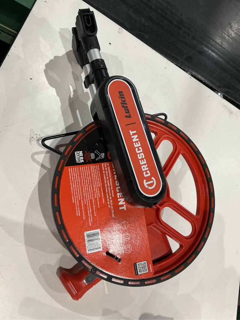 Condition photo showing As Is for 12 in. sae measuring wheel
