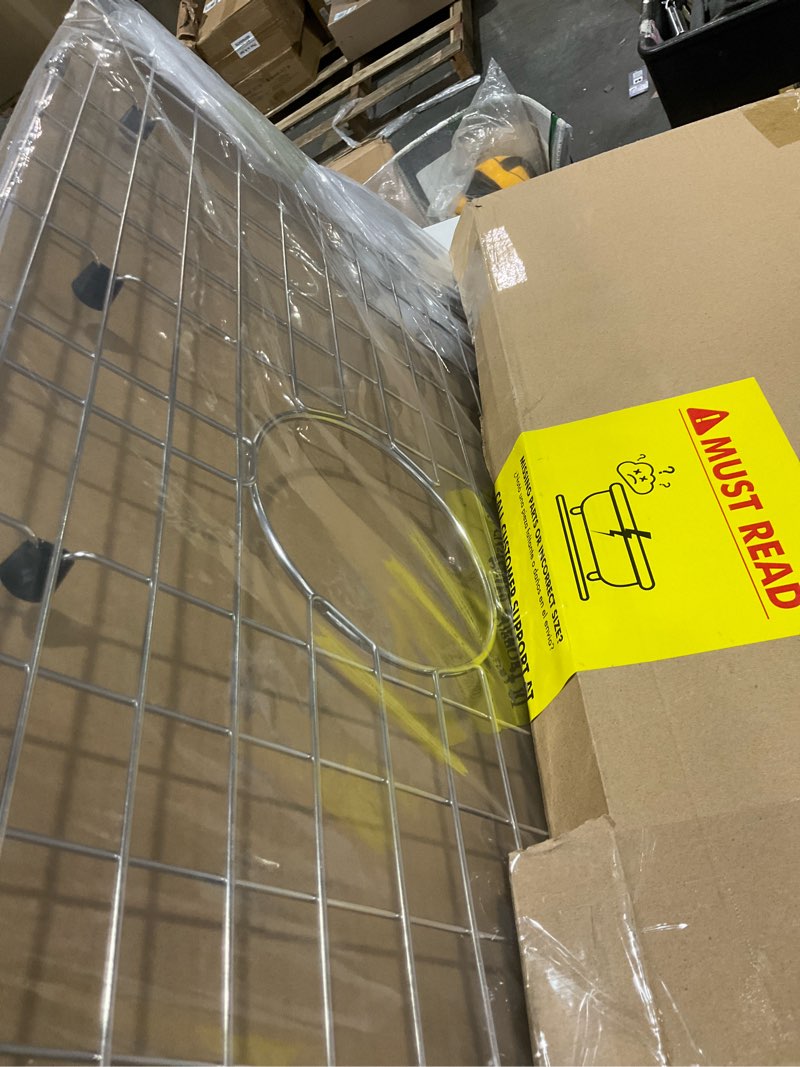 Condition photo showing Good Condition for serene valley sink protector grid 26-1/16" x 14-1/16", centered drain with corner radius 3-1/2", 304 stainless steel material nlw2614c