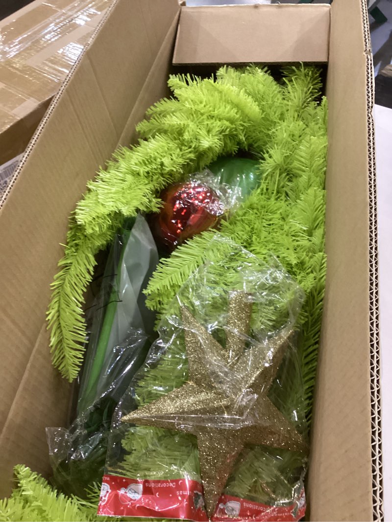 Condition photo showing Good Condition for 5 ft Pre-lit Whimsical Christmas Tree Set with Red and Green Ornament, String Lights, Lime Green Furry Skirt, Star Tree Topper for Xmas Holiday Indoor Outdoor Home Porch Yard Decor(5 ft)