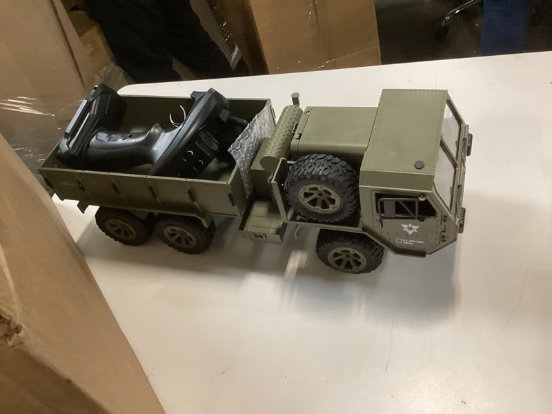 Condition photo showing Good Condition for GoolRC RC Military Truck, 1:12 Scale 6WD Remote Control Car, 2.4GHz Army Cars All Terrain Off-Road Truck, Electric Toy Vehicle Gift for Adults