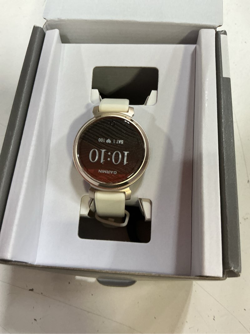 Condition photo showing New/Like New for garmin lily 2, small and stylish smartwatch, hidden display, patterned lens, up to 5 days battery life, coconut