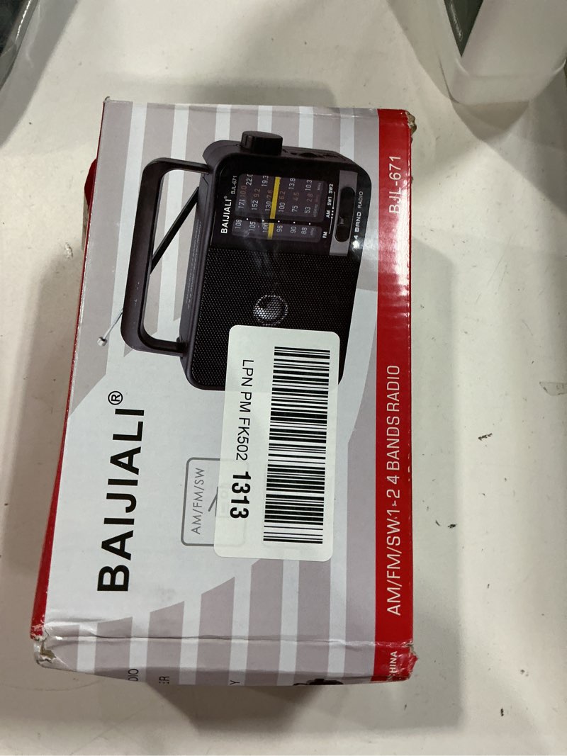 Condition photo showing New/Like New for Portable AM/FM Transistor Radio with Loud Speaker, Battery or USB Powered - Compact Emergency Radio for Indoor, Outdoor, Travel & Storms (Model BJL-671) Gray