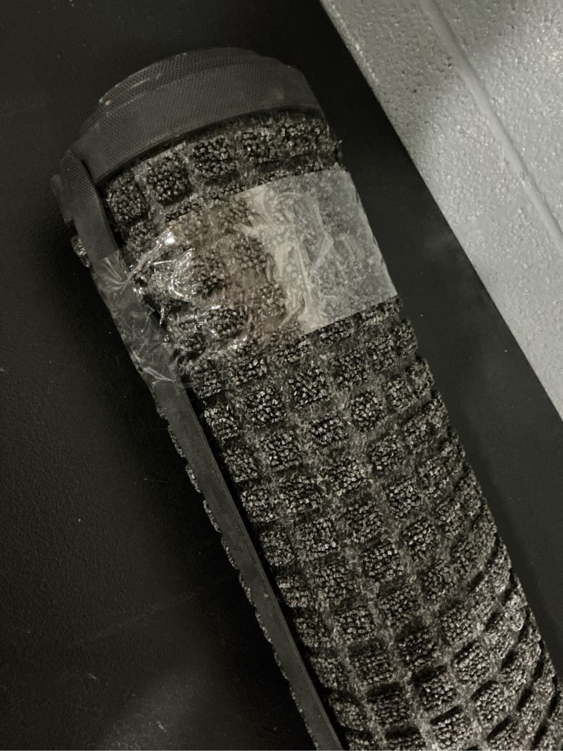 Condition photo showing As Is for gray non-slip grip indoor or outdoor utility mat