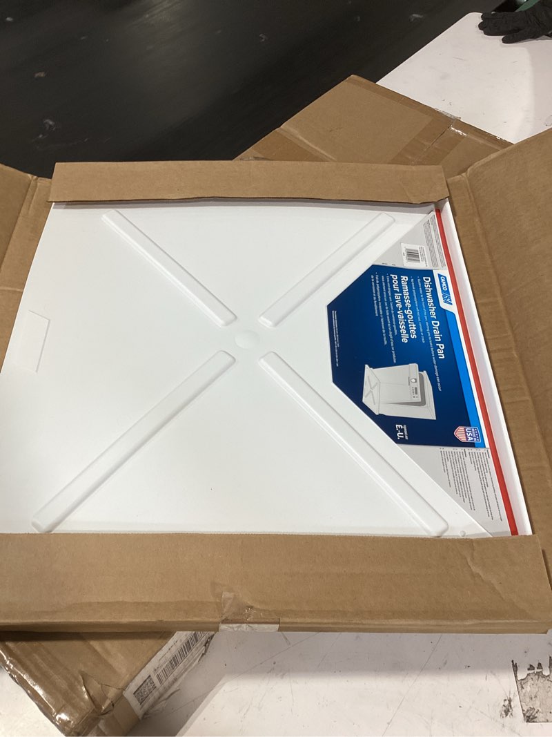 Condition photo showing As Is for camco dishwasher drain pan - measures 24” x 20-1/2” od - protects floors, cabinets, walls & features front opening for easy leak detection - crafted of heavy-duty polymer - 24” x 20-1/2” (20600) white