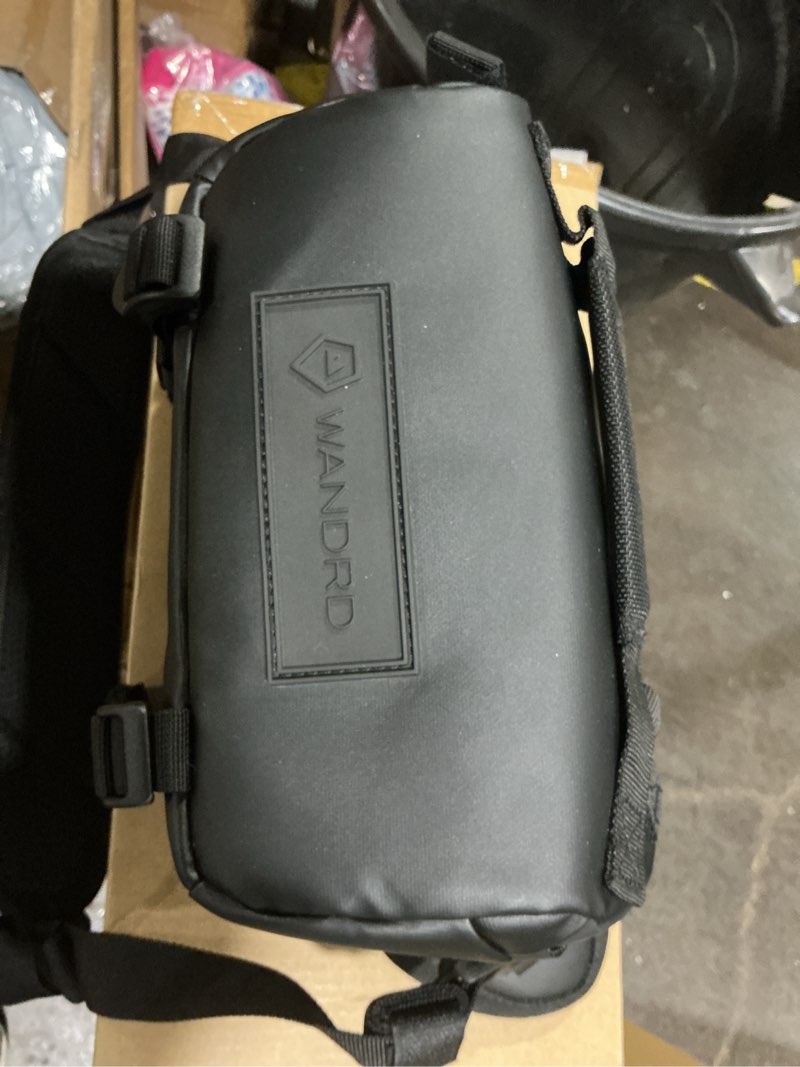 Condition photo showing Good Condition for wandrd rogue v1 3l sling: compact camera sling and crossbody bag with fast access, 3-way carry– lightweight everyday bag great for travel, photography, and daily use (black)