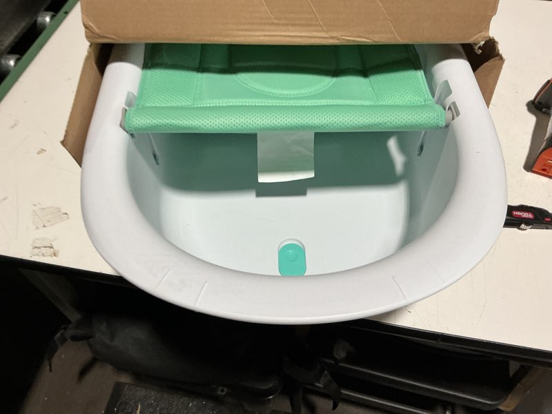 Condition photo showing New/Like New for frida baby 4-in-1 grow-with-me baby bathtub, baby tub for newborns to toddler with removable bath seat & backrest for bath support in tub