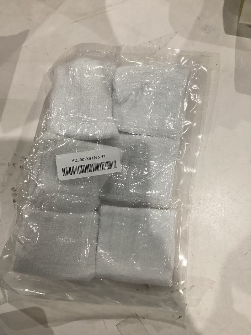 Pack of six white sports wrist bands